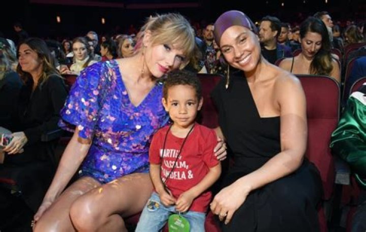ALICIA KEYS AND SON, GENESIS, ATTEND TAYLOR SWIFT CONCERT