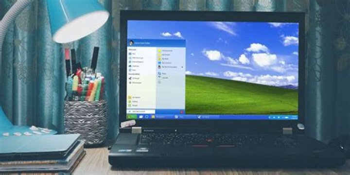 How can I replace Windows 7 with Windows XP on my laptop?