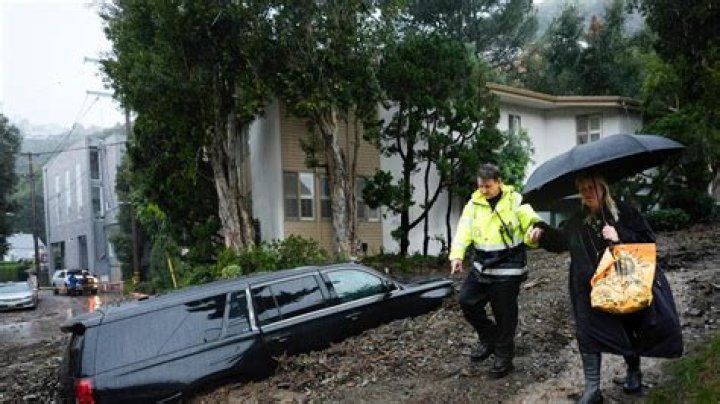Less rain forecast but historic Southern California storm still threatens flooding and landslides