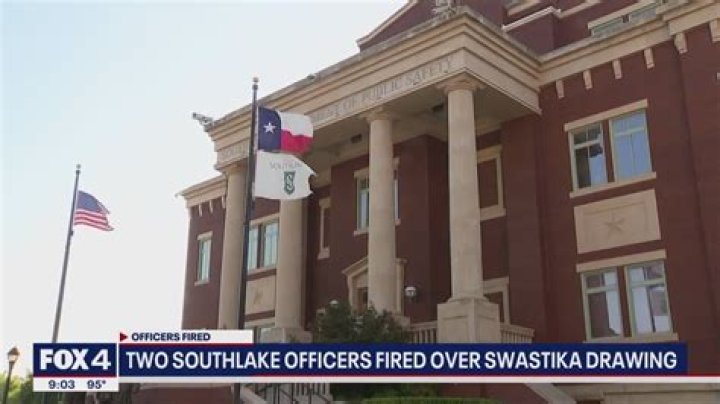 	OFFICER FACES FIRING OVER SWASTIKA TATTOO	