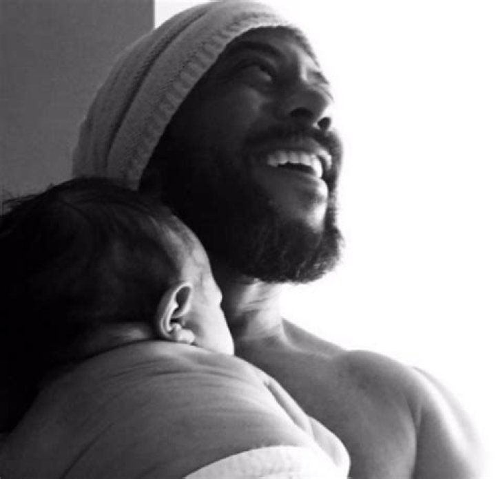 ROCKMOND DUNBAR AND WIFE WELCOME SON