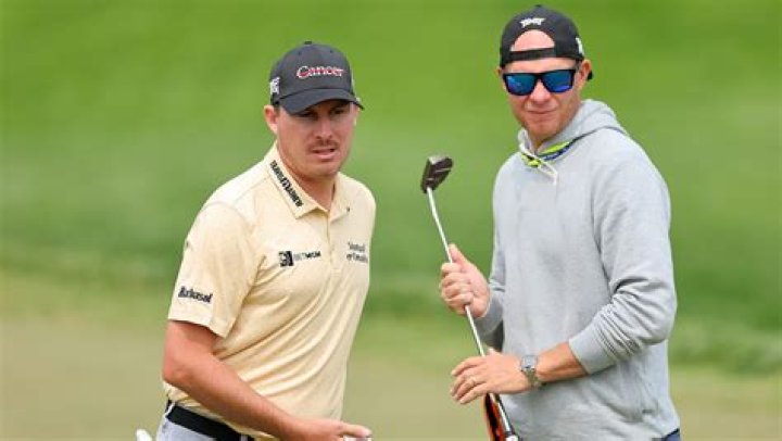 **The Dynamic Duo: Joel Dahmen And His Caddie**