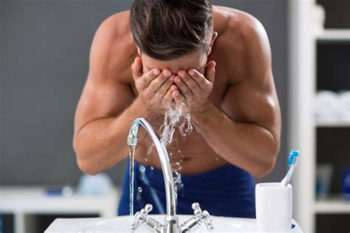 The exact number of times men should wash their face everyday