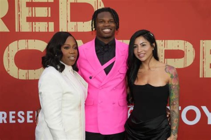 Who are Travis Hunter's parents?
