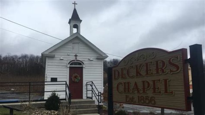 Woman charged for stealing donation box from Decker's Chapel